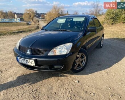 Чорний Міцубісі Lancer, об'ємом двигуна 1.6 л та пробігом 217 тис. км за 5200 $, фото 1 на Automoto.ua