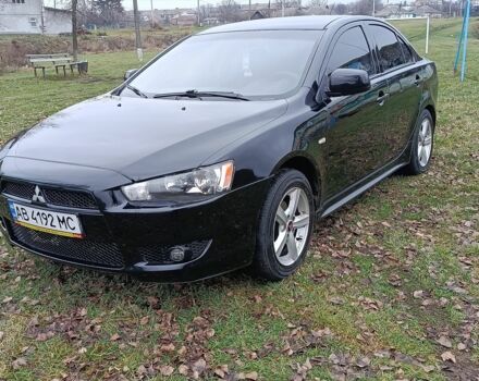 Чорний Міцубісі Lancer, об'ємом двигуна 2 л та пробігом 200 тис. км за 5100 $, фото 1 на Automoto.ua