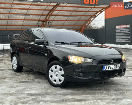 Черный Мицубиси Лансер, объемом двигателя 1.5 л и пробегом 197 тыс. км за 5700 $, фото 1 на Automoto.ua