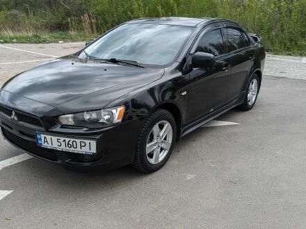 Чорний Міцубісі Lancer, об'ємом двигуна 2 л та пробігом 170 тис. км за 6850 $, фото 1 на Automoto.ua