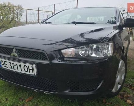 Черный Мицубиси Лансер, объемом двигателя 1.5 л и пробегом 190 тыс. км за 5200 $, фото 1 на Automoto.ua