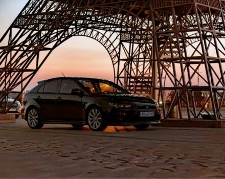 Чорний Міцубісі Lancer, об'ємом двигуна 2 л та пробігом 190 тис. км за 7100 $, фото 1 на Automoto.ua