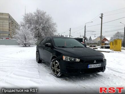 Чорний Міцубісі Lancer, об'ємом двигуна 1.5 л та пробігом 164 тис. км за 6250 $, фото 1 на Automoto.ua