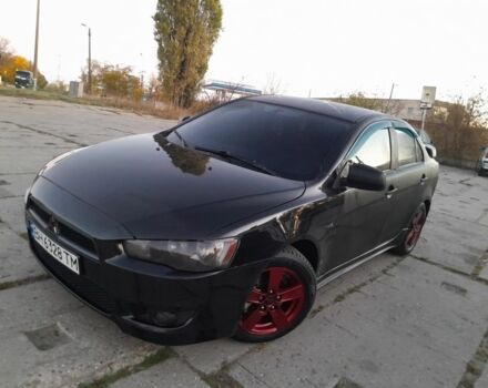 Черный Мицубиси Лансер, объемом двигателя 2 л и пробегом 228 тыс. км за 7000 $, фото 1 на Automoto.ua