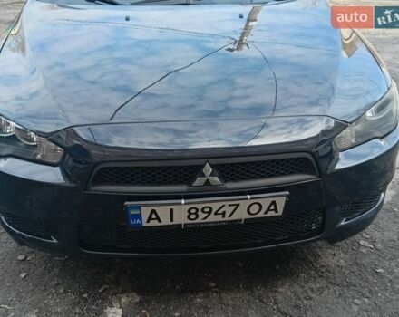Черный Мицубиси Лансер, объемом двигателя 1.5 л и пробегом 229 тыс. км за 5000 $, фото 1 на Automoto.ua