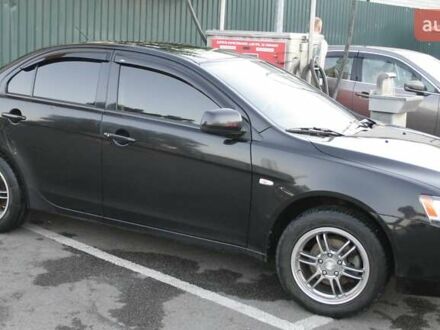 Черный Мицубиси Лансер, объемом двигателя 1.5 л и пробегом 110 тыс. км за 6950 $, фото 1 на Automoto.ua