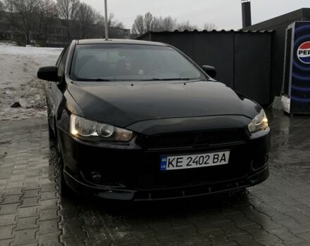 Черный Мицубиси Лансер, объемом двигателя 2 л и пробегом 116 тыс. км за 6500 $, фото 1 на Automoto.ua