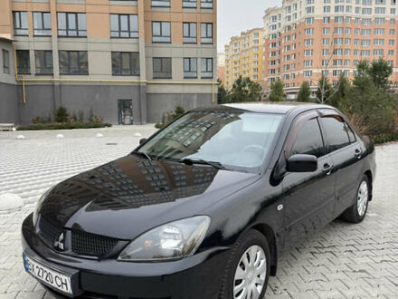 Чорний Міцубісі Lancer, об'ємом двигуна 1.6 л та пробігом 240 тис. км за 5200 $, фото 1 на Automoto.ua