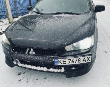 Черный Мицубиси Лансер, объемом двигателя 1.5 л и пробегом 220 тыс. км за 6019 $, фото 1 на Automoto.ua
