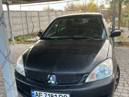 Чорний Міцубісі Lancer, об'ємом двигуна 1.6 л та пробігом 324 тис. км за 3800 $, фото 1 на Automoto.ua