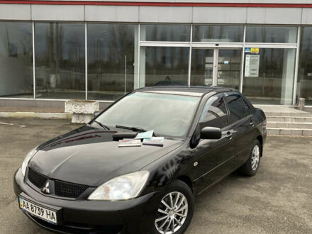 Черный Мицубиси Лансер, объемом двигателя 1.6 л и пробегом 350 тыс. км за 4500 $, фото 1 на Automoto.ua