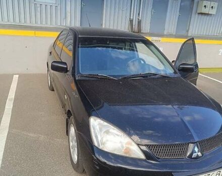 Чорний Міцубісі Lancer, об'ємом двигуна 1.6 л та пробігом 191 тис. км за 3800 $, фото 1 на Automoto.ua