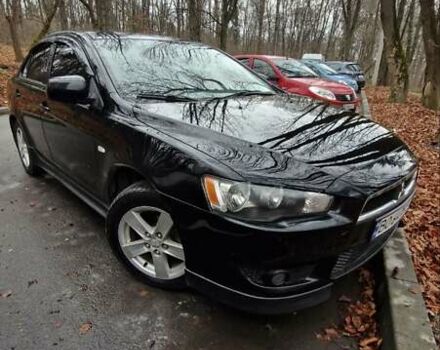 Чорний Міцубісі Lancer, об'ємом двигуна 2 л та пробігом 302 тис. км за 7200 $, фото 1 на Automoto.ua