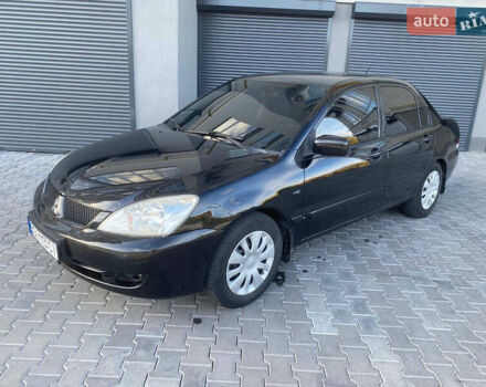 Чорний Міцубісі Lancer, об'ємом двигуна 1.6 л та пробігом 351 тис. км за 3999 $, фото 1 на Automoto.ua