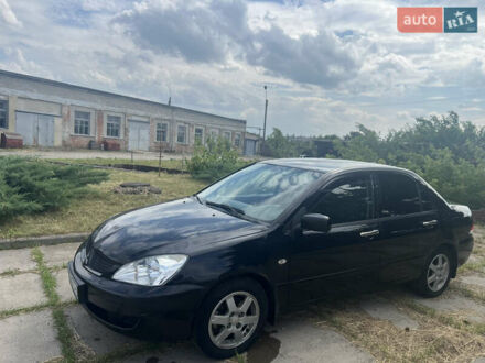 Міцубісі Lancer 2008 у Лозовой на Automoto.ua Чорний Міцубісі Lancer, об'ємом двигуна 1.58 л та пробігом 243 тис. км за 3950 $, фото 1 на Automoto.ua