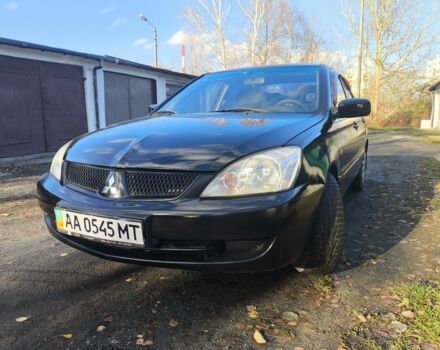 Чорний Міцубісі Lancer, об'ємом двигуна 1.6 л та пробігом 243 тис. км за 3200 $, фото 1 на Automoto.ua