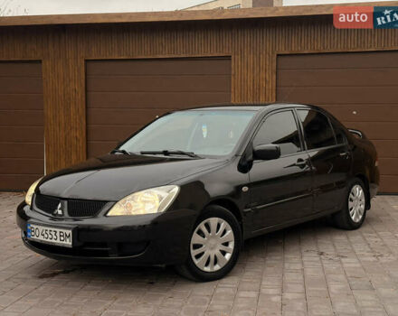 Чорний Міцубісі Lancer, об'ємом двигуна 1.6 л та пробігом 265 тис. км за 4700 $, фото 1 на Automoto.ua