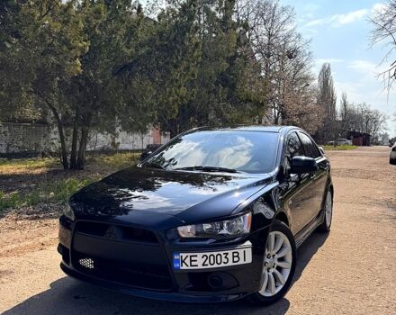 Черный Мицубиси Лансер, объемом двигателя 2 л и пробегом 260 тыс. км за 6900 $, фото 1 на Automoto.ua