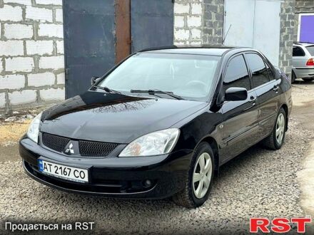 Чорний Міцубісі Lancer, об'ємом двигуна 1.6 л та пробігом 241 тис. км за 4799 $, фото 1 на Automoto.ua