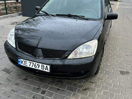 Чорний Міцубісі Lancer, об'ємом двигуна 1.6 л та пробігом 277 тис. км за 3900 $, фото 1 на Automoto.ua
