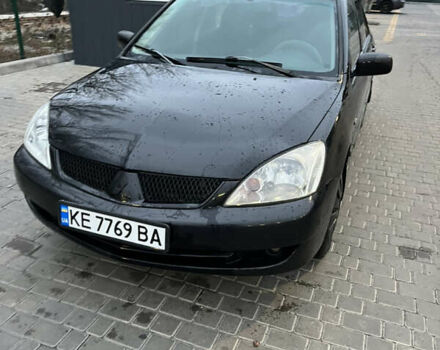 Чорний Міцубісі Lancer, об'ємом двигуна 1.6 л та пробігом 277 тис. км за 3900 $, фото 1 на Automoto.ua