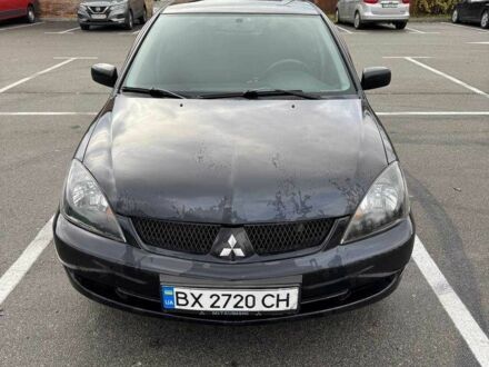 Чорний Міцубісі Lancer, об'ємом двигуна 1.6 л та пробігом 245 тис. км за 4500 $, фото 1 на Automoto.ua