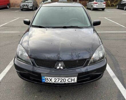 Чорний Міцубісі Lancer, об'ємом двигуна 1.6 л та пробігом 245 тис. км за 4500 $, фото 1 на Automoto.ua