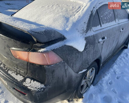 Чорний Міцубісі Lancer, об'ємом двигуна 2 л та пробігом 300 тис. км за 2000 $, фото 1 на Automoto.ua