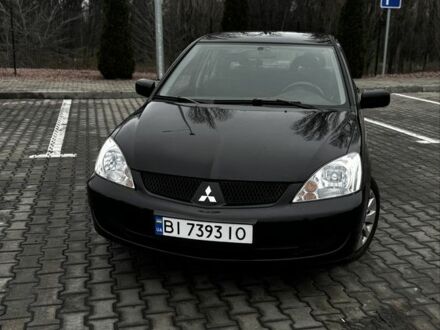 Чорний Міцубісі Lancer, об'ємом двигуна 1.6 л та пробігом 168 тис. км за 3700 $, фото 1 на Automoto.ua
