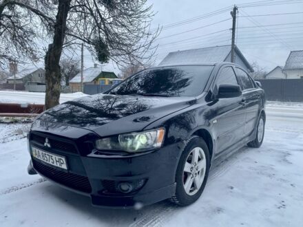 Чорний Міцубісі Lancer, об'ємом двигуна 2 л та пробігом 180 тис. км за 6999 $, фото 1 на Automoto.ua