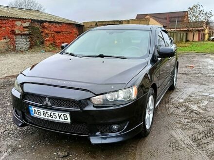 Чорний Міцубісі Lancer, об'ємом двигуна 2 л та пробігом 233 тис. км за 7250 $, фото 1 на Automoto.ua