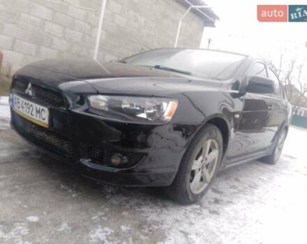 Черный Мицубиси Лансер, объемом двигателя 2 л и пробегом 225 тыс. км за 5400 $, фото 1 на Automoto.ua