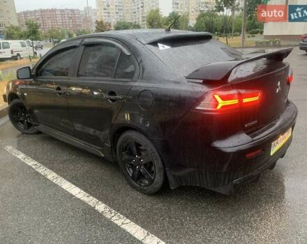Черный Мицубиси Лансер, объемом двигателя 1.5 л и пробегом 250 тыс. км за 3800 $, фото 1 на Automoto.ua