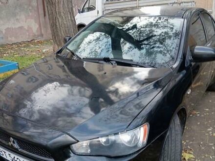 Черный Мицубиси Лансер, объемом двигателя 1.5 л и пробегом 235 тыс. км за 4500 $, фото 1 на Automoto.ua