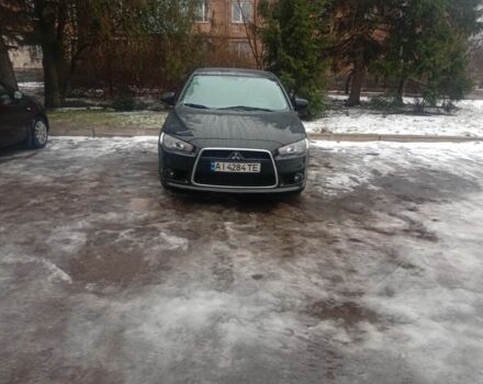 Черный Мицубиси Лансер, объемом двигателя 1.5 л и пробегом 240 тыс. км за 4597 $, фото 1 на Automoto.ua