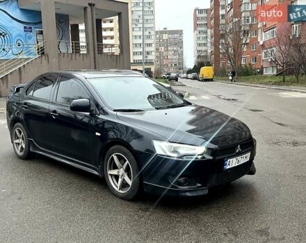 Чорний Міцубісі Lancer, об'ємом двигуна 2 л та пробігом 217 тис. км за 7000 $, фото 1 на Automoto.ua