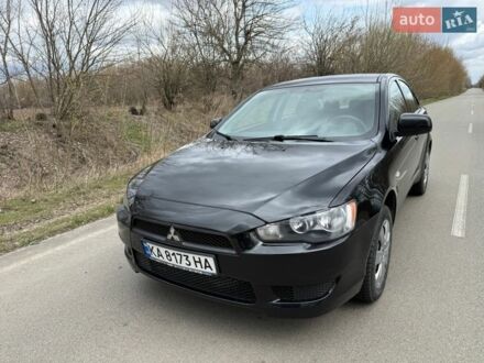 Черный Мицубиси Лансер, объемом двигателя 1.5 л и пробегом 203 тыс. км за 4900 $, фото 1 на Automoto.ua