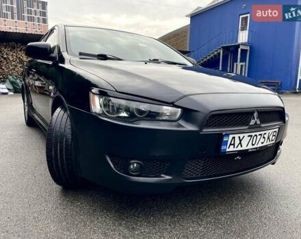 Чорний Міцубісі Lancer, об'ємом двигуна 2 л та пробігом 217 тис. км за 5800 $, фото 1 на Automoto.ua