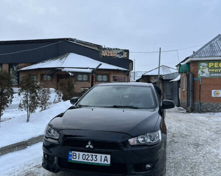 Черный Мицубиси Лансер, объемом двигателя 2 л и пробегом 250 тыс. км за 6800 $, фото 1 на Automoto.ua