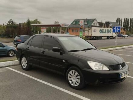 Мицубиси Лансер 2008 в Луцке на Automoto.ua Черный Мицубиси Лансер, объемом двигателя 1.6 л и пробегом 179 тыс. км за 4900 $, фото 1 на Automoto.ua