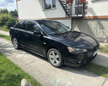 Чорний Міцубісі Lancer, об'ємом двигуна 2 л та пробігом 210 тис. км за 6250 $, фото 1 на Automoto.ua