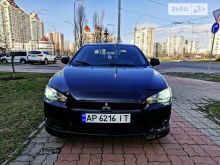 Чорний Міцубісі Lancer, об'ємом двигуна 2 л та пробігом 182 тис. км за 7650 $, фото 1 на Automoto.ua