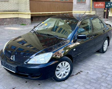 Чорний Міцубісі Lancer, об'ємом двигуна 1.6 л та пробігом 183 тис. км за 3750 $, фото 1 на Automoto.ua