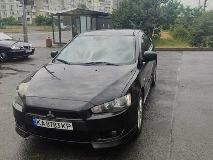 Черный Мицубиси Лансер, объемом двигателя 2 л и пробегом 229 тыс. км за 7300 $, фото 1 на Automoto.ua