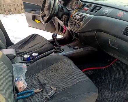 Чорний Міцубісі Lancer, об'ємом двигуна 1.6 л та пробігом 26000 тис. км за 1800 $, фото 1 на Automoto.ua