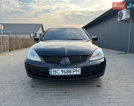 Чорний Міцубісі Lancer, об'ємом двигуна 1.58 л та пробігом 237 тис. км за 4500 $, фото 1 на Automoto.ua