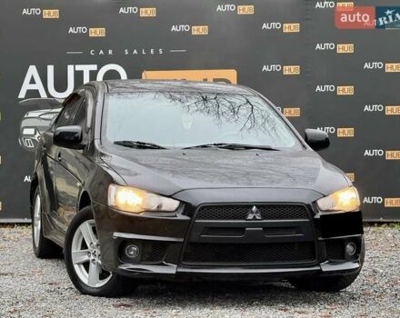 Чорний Міцубісі Lancer, об'ємом двигуна 2 л та пробігом 118 тис. км за 6200 $, фото 1 на Automoto.ua