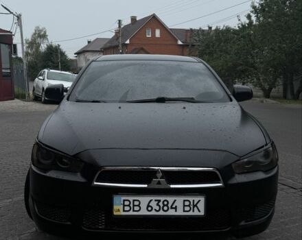 Чорний Міцубісі Lancer, об'ємом двигуна 2 л та пробігом 127 тис. км за 6200 $, фото 1 на Automoto.ua