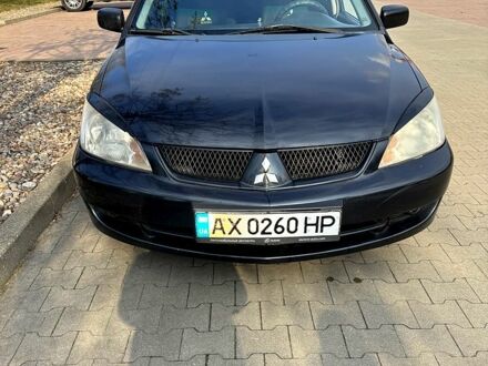 Мицубиси Лансер 2008 в Харькове на Automoto.ua Черный Мицубиси Лансер, объемом двигателя 1.6 л и пробегом 184 тыс. км за 4000 $, фото 1 на Automoto.ua