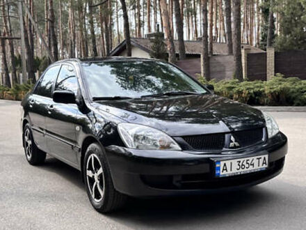 Мицубиси Лансер 2008 в Новомосковске на Automoto.ua Черный Мицубиси Лансер, объемом двигателя 1.58 л и пробегом 246 тыс. км за 4800 $, фото 1 на Automoto.ua